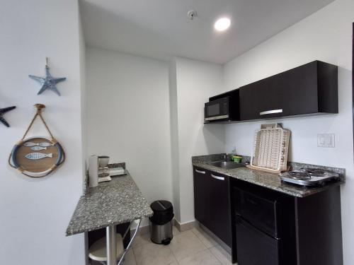 Η κουζίνα ή μικρή κουζίνα στο Playa Coronado Tu Escapada Perfecta - Netflix - Pet Friendly