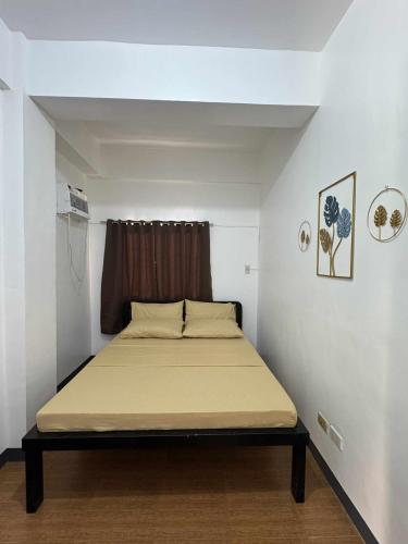 Postel nebo postele na pokoji v ubytování GLC Tourist Inn
