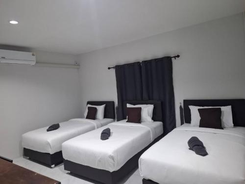 Postel nebo postele na pokoji v ubytování Station Hotel