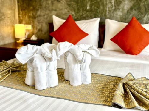 Postel nebo postele na pokoji v ubytování Lanta Feelgood Long beach resort