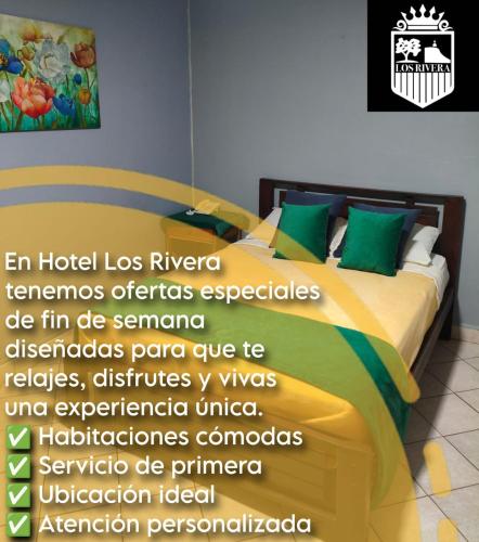 Postel nebo postele na pokoji v ubytování Hotel Los Rivera