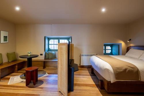Postel nebo postele na pokoji v ubytování Hotel 1821