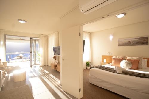 Ένα ή περισσότερα κρεβάτια σε δωμάτιο στο Affordable Seaview Getaway