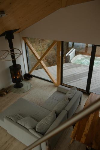 Katil atau katil-katil dalam bilik di Szőcs-birtok Apartments