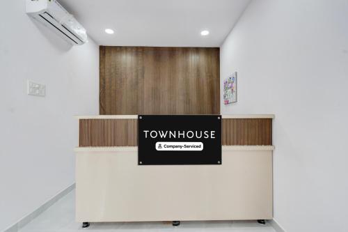 a view of a room with a townhouse sign on a wall at Super Townhouse B N Reddy Formerly Capitol Stay Inn in Surūrnagar