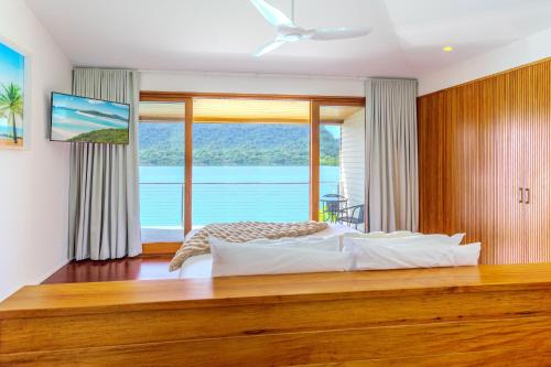 Katil atau katil-katil dalam bilik di Cala 14 - A Private Cove Retreat