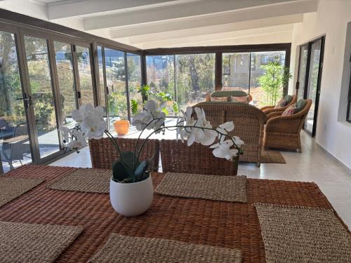 Posezení v ubytování 105 Clarens Golf Villa