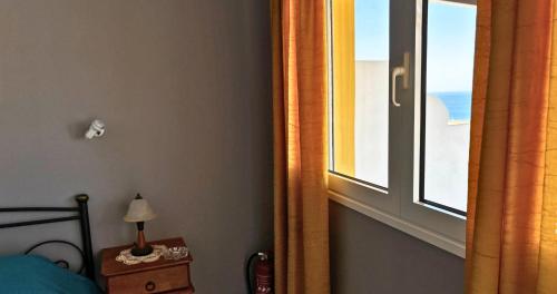 Кровать или кровати в номере Rachi Apartments