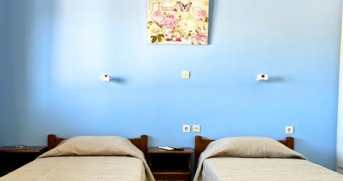 Кровать или кровати в номере Rachi Apartments