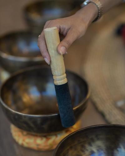a person holding a banana in a pan at Kavya Himalayas in Nagarkot