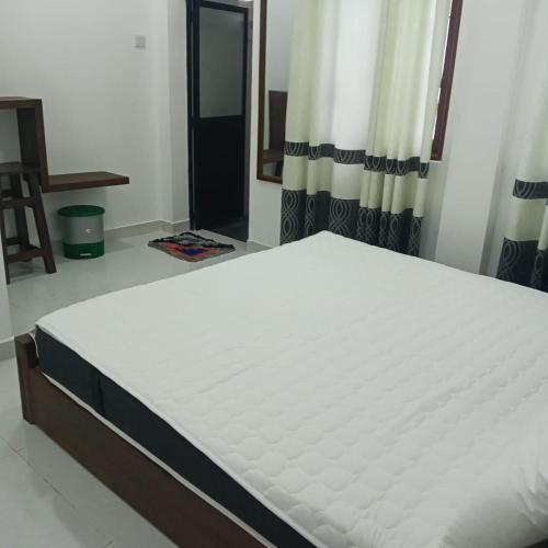 Cama o camas de una habitación en seenaalee villa