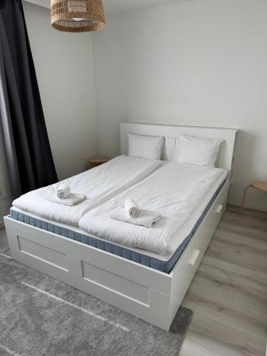 Voodi või voodid majutusasutuse 2 bedroom condo with a balcony in the center of Helsinki toas