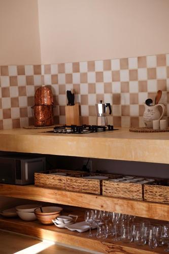 Kuchyň nebo kuchyňský kout v ubytování Nicara Luxury Ecocabin Honeypunch