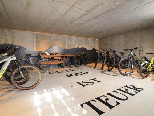 a group of bikes parked in a room at Pension Höfler - Fernblick in Schenna