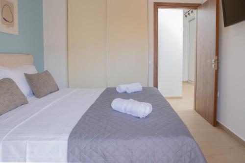 Ένα ή περισσότερα κρεβάτια σε δωμάτιο στο Sea View Apartment