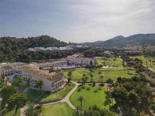 an aerial view of a resort with mountains in the background at Grand Hyatt La Manga Club Golf & Spa in La Manga del Mar Menor