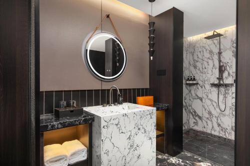 Ένα μπάνιο στο Days Hotel by Wyndham Zhuzhou Liling