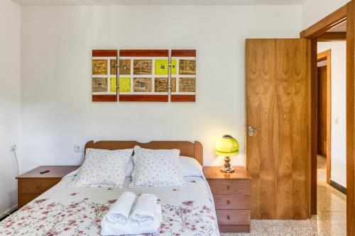 Postel nebo postele na pokoji v ubytování Casa en Albanyà