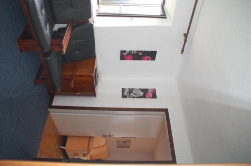 an overhead view of a stair case in a train at Stanjel Carst House 13 Andreja in Štanjel