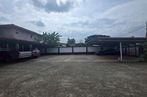 a gas station with a truck parked in a lot at Phaiboon Hotel & Resort in Pak Chong