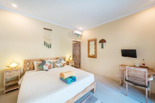Katil atau katil-katil dalam bilik di Kakiang Guesthouse