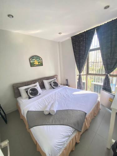 Postel nebo postele na pokoji v ubytování 101 SEOUL HOSTEL (101 โซล โฮสเทล)