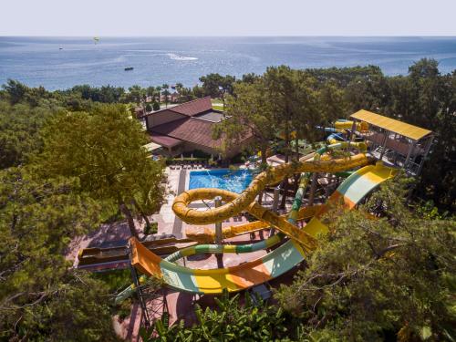 an image of a water park with a roller coaster at Akka Antedon Hotel - Premium Ultra All Inclusive in Beldibi