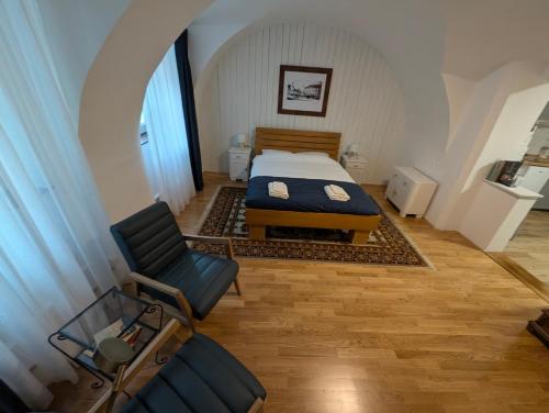 Katil atau katil-katil dalam bilik di Franziskaner studio apartman