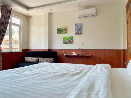 Postel nebo postele na pokoji v ubytování Flaco Hostel Sapa
