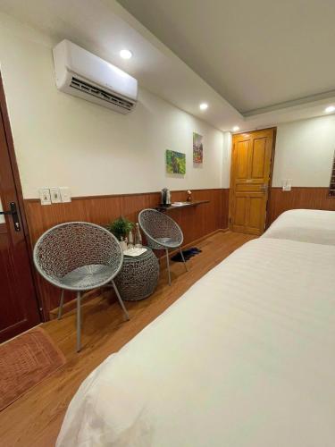 Postel nebo postele na pokoji v ubytování Flaco Hostel Sapa