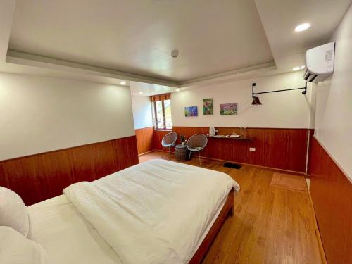 TV a/nebo společenská místnost v ubytování Flaco Hostel Sapa