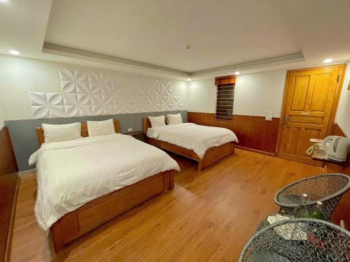 Postel nebo postele na pokoji v ubytování Flaco Hostel Sapa