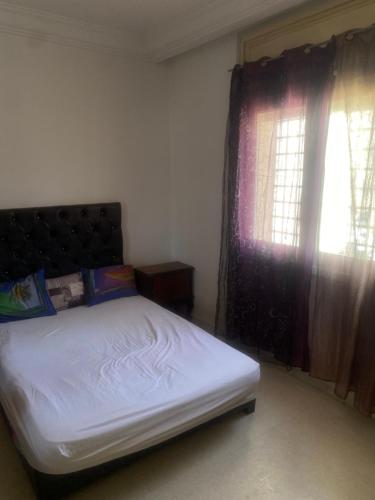 Postel nebo postele na pokoji v ubytování Appartement à Bizerte