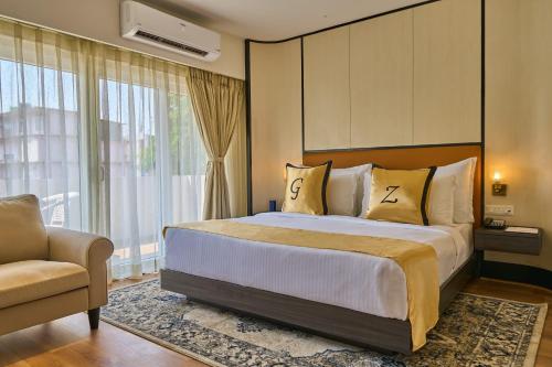 Ένα ή περισσότερα κρεβάτια σε δωμάτιο στο Shulem Boutique Hotel