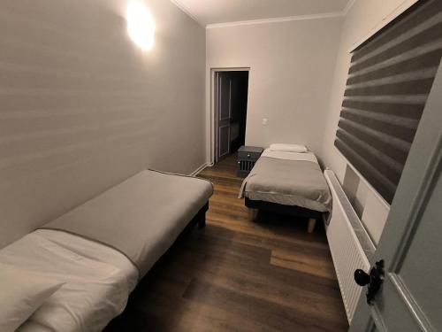 Postel nebo postele na pokoji v ubytování Hotel Plaza Sky