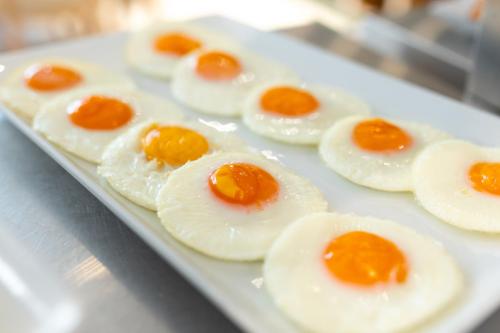a tray of deviled eggs on a table at Hotel Jesulum in Lido di Jesolo
