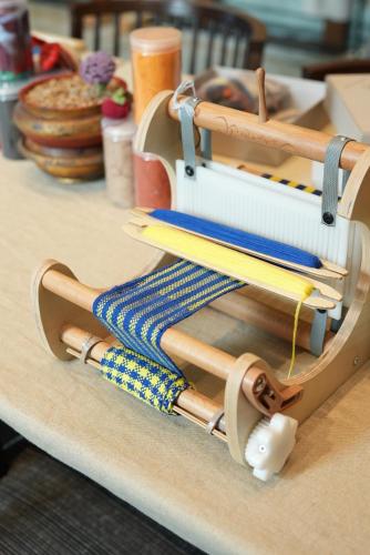 a sewing machine sitting on top of a table at The St. Regis Lhasa Resort in Lhasa
