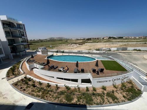 Πισίνα στο ή κοντά στο Larnaca Elysium Seaside & Pool Retreat