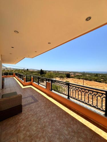 a view from the balcony of a house at Roe Sea View in Kyparissia