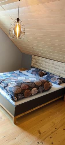 a bed with cookies on it in a room at Ferienwohnung Hennrich in Weilbach