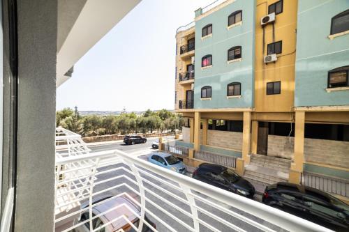 a view from the balcony of a building at New Luxury 2 Single Bed Studio Apartment- BV3 in St Paul's Bay