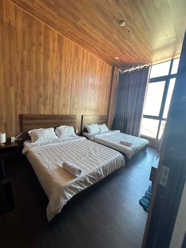 Ένα ή περισσότερα κρεβάτια σε δωμάτιο στο Hotel Apartment Da Lat