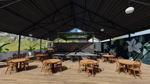 Un restaurante u otro lugar para comer en AURA Lounge