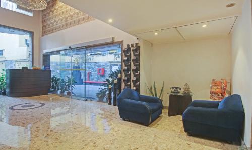 Posezení v ubytování Treebo Premium Dee Empresa, Park Street