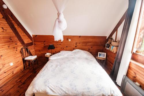 Postel nebo postele na pokoji v ubytování Gîte d'Aunac
