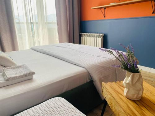 Ένα ή περισσότερα κρεβάτια σε δωμάτιο στο Апартаменты напротив моря в доме бизнес класса Guru residence