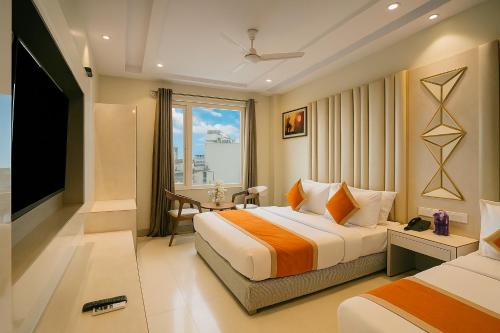 Ένα ή περισσότερα κρεβάτια σε δωμάτιο στο Hotel Worth - 1 Minute from Connaught Place & New Delhi Station