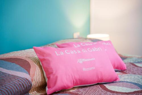 Letto o letti in una camera di La Casa di Gabri Humanitas ForumAssago Milano centro