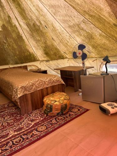 Letto o letti in una camera di Hovek Guest House