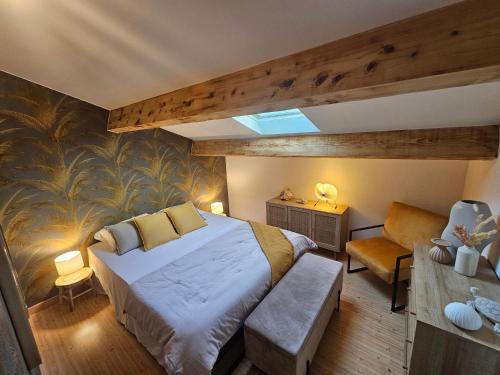 Ένα ή περισσότερα κρεβάτια σε δωμάτιο στο Le Doux Rivage avec Vue Lagune Nature Plage à Pied Clim Parking Prive